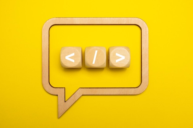 Coding language development icon on yellow background Software development concept on speech bubbles