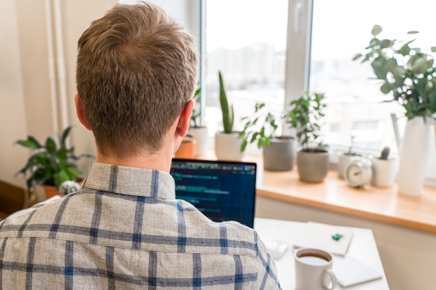 coding on screen man's hands coding and programming on screen laptop development web developer