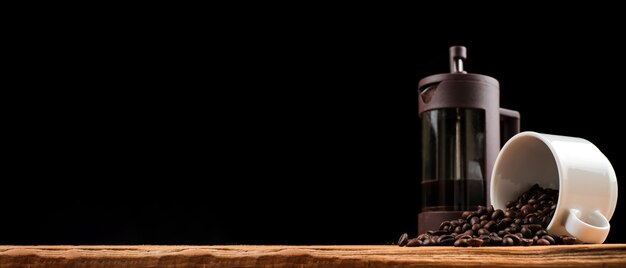 Coffee backgrounds, coffee cup and coffee french press on rustic wooden table with copy space