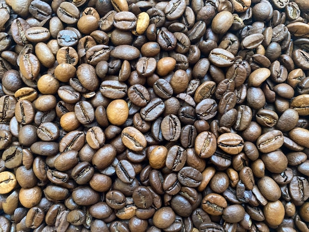 Coffee bean background closeup Texture of coffee beans