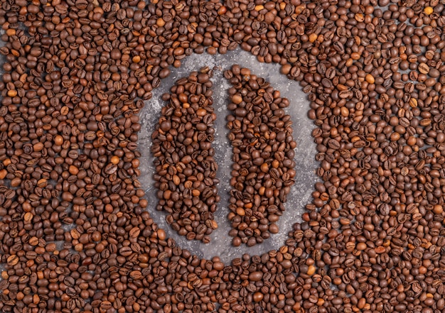 coffee bean made from coffee beans on gray background