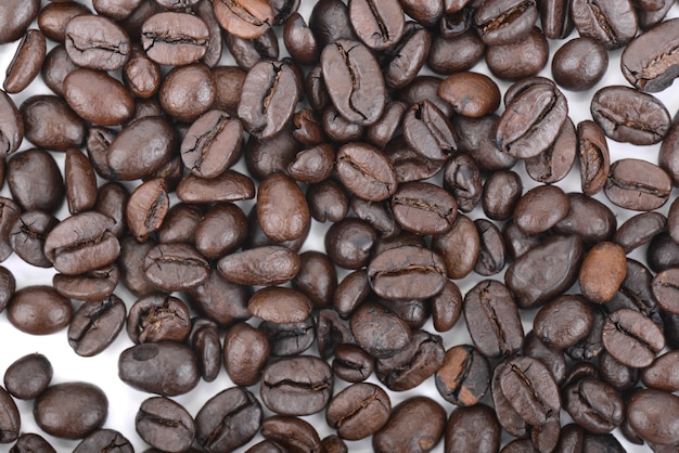 Coffee beans background scattered 