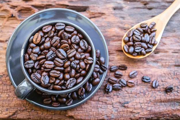 Coffee beans in black cup