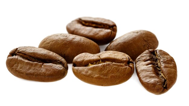 Coffee beans closeup macro isolated on white background