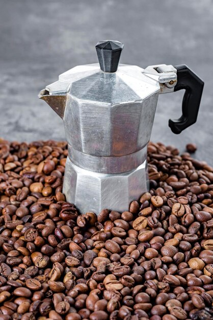 https://img.freepik.com/premium-photo/coffee-beans-coffee-maker_9083-10222.jpg?size=626&ext=jpg