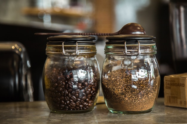 Photo coffee beans and coffee powder in the cafe