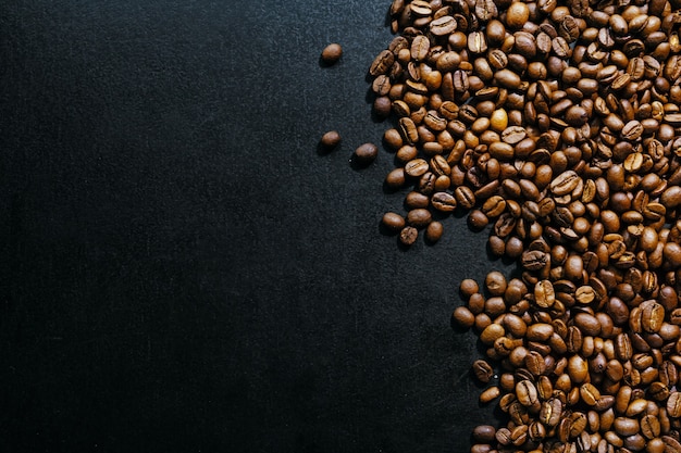 Coffee beans on dark background. Top View. Coffee concept.