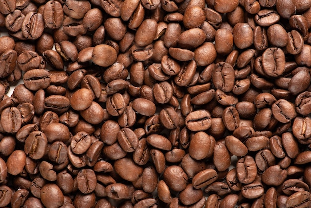 Coffee beans filling the screen, Top view.