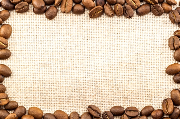 coffee beans frame on sack cloth