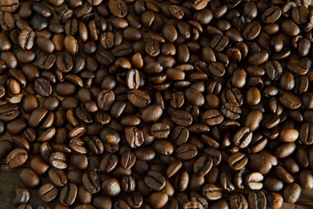 Photo coffee beans grains texture top view