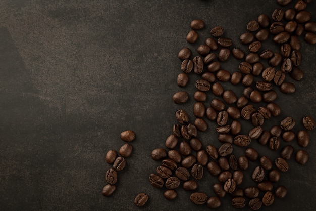 Photo coffee beans on grunge background.