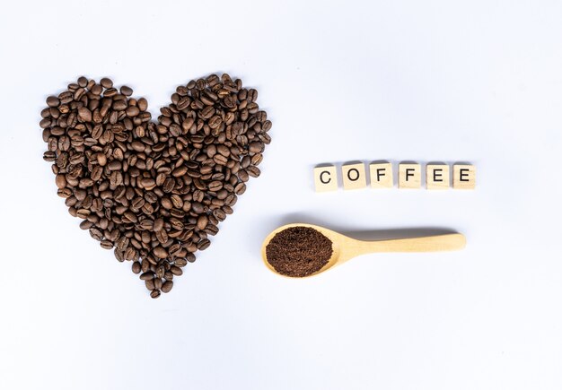 Coffee beans in heart shaped with coffee word