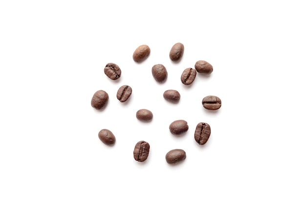 Coffee beans isolated on white background. Close-up.