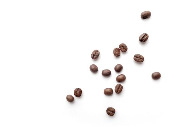 Coffee beans isolated on white background. Close-up.