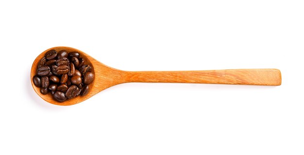 Coffee beans isolated in wooden spoon