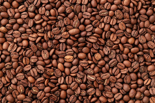 Coffee in beans macro Background of coffee texture