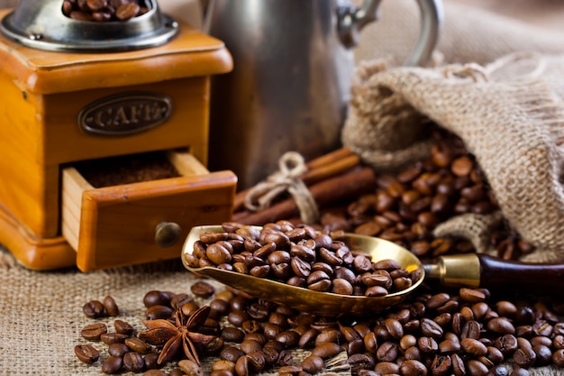 Coffee beans on an old background