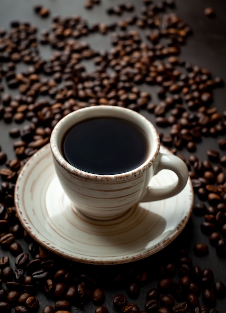 Coffee and beans on the old kitchen table. Top view with copyspace for your text.