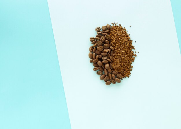 Coffee beans on paper blue