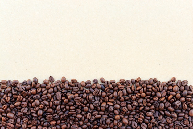 Photo coffee beans on paper texture