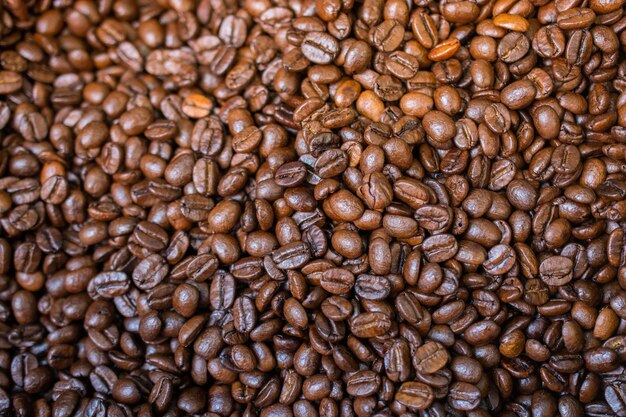 Coffee beans ready for the grinder background