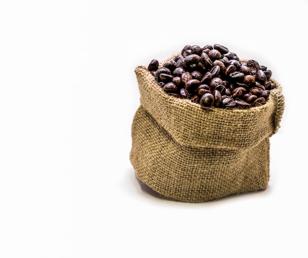 Coffee beans in a sack on a white background