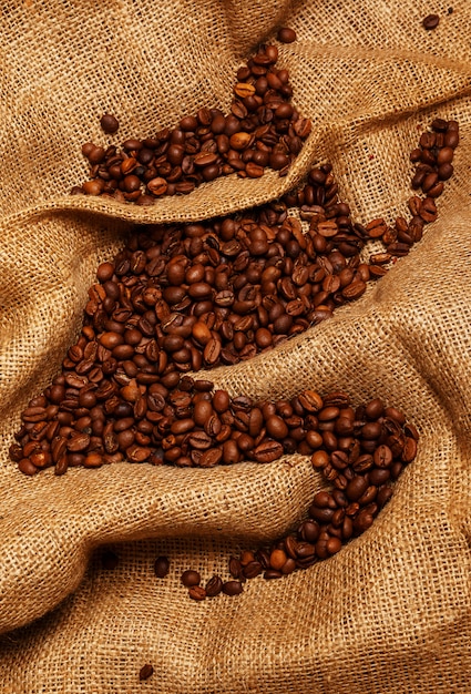 Coffee beans on sackcloth