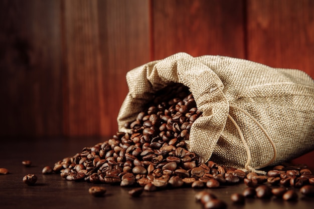 Coffee beans scattered of the bag.