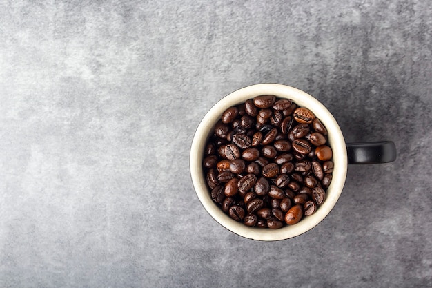 Coffee Beans And White Black Cup