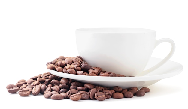 Photo coffee beans and white cup close-up on a white background. isolated