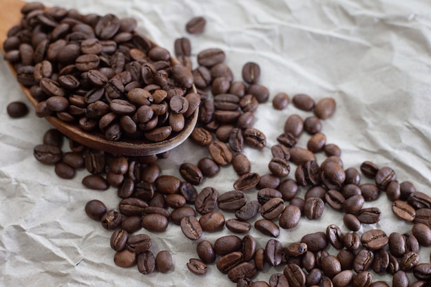 Coffee beans on white fabric