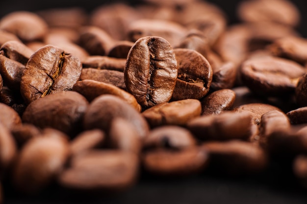 Coffee beans on wood background