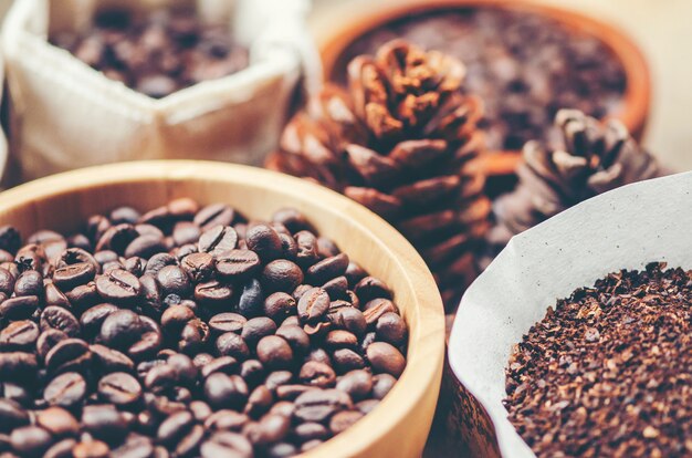 Coffee beans on wooden background, arabica coffee