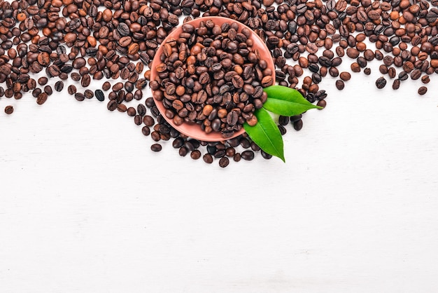 Coffee beans On a wooden background Top view Copy space