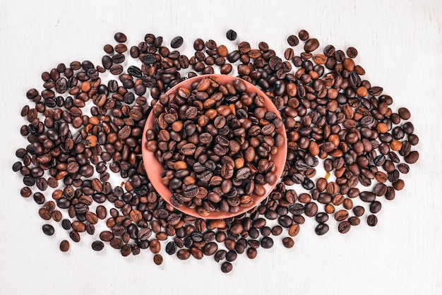 Coffee beans On a wooden background Top view Copy space