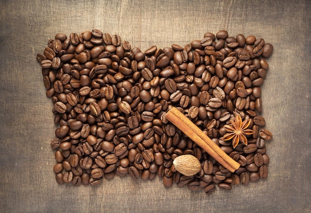 Coffee beans on wooden background