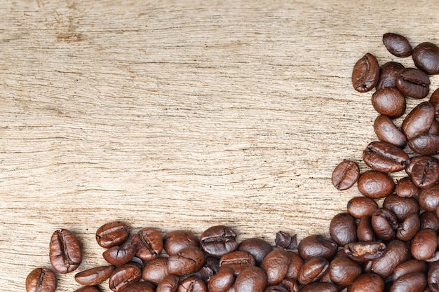 Coffee beans on the wooden floor