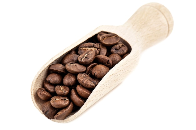 Coffee beans in wooden scoop spoon on white background