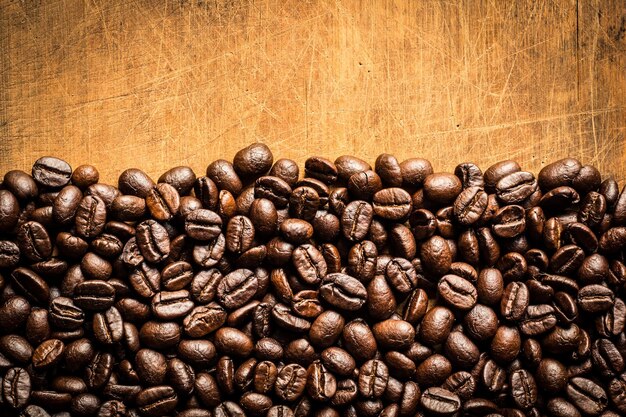 Coffee beans on a wooden table