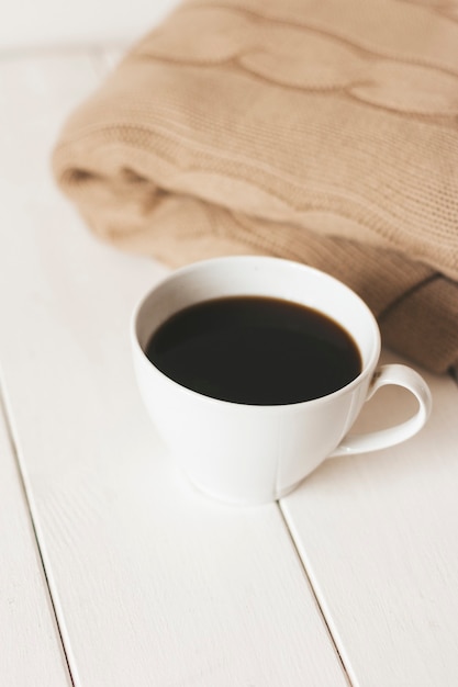 coffee and a blanket on a white background