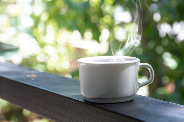 Coffee brake set,cups of hot coffee espresso on the table and light background