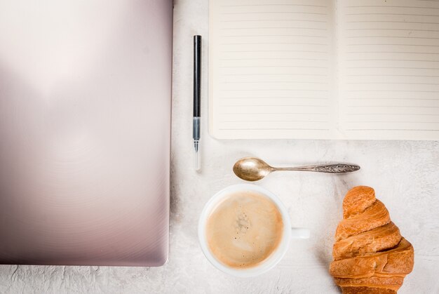 Coffee break. Breakfast or lunch at work. Desk in the office.