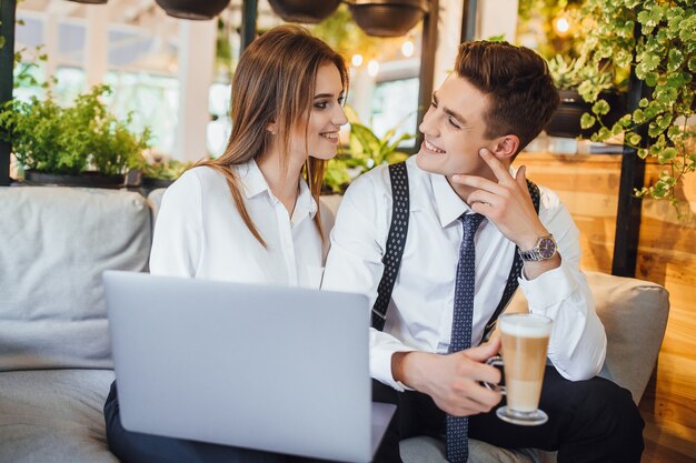 Coffee break. co-workers communicate on a break in a smart space.