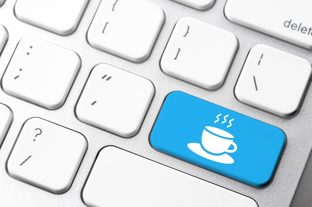 Coffee break & holiday icon on computer keyboard