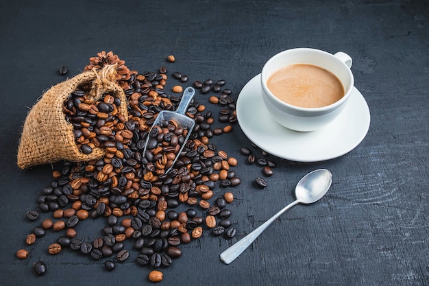 Coffee in coffee cups and roasted coffee beans