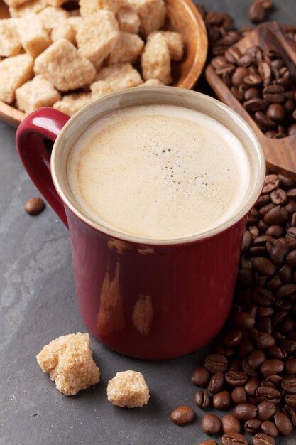 Coffee cup beans and brown sugar