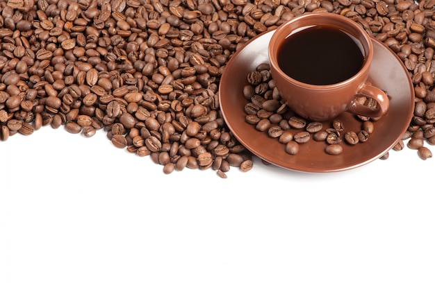 Coffee cup and beans on a white background