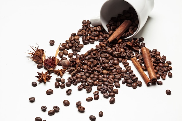 Coffee cup and beans on a white background