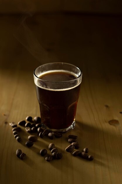 Coffee Cup and Beans on Wooden Table