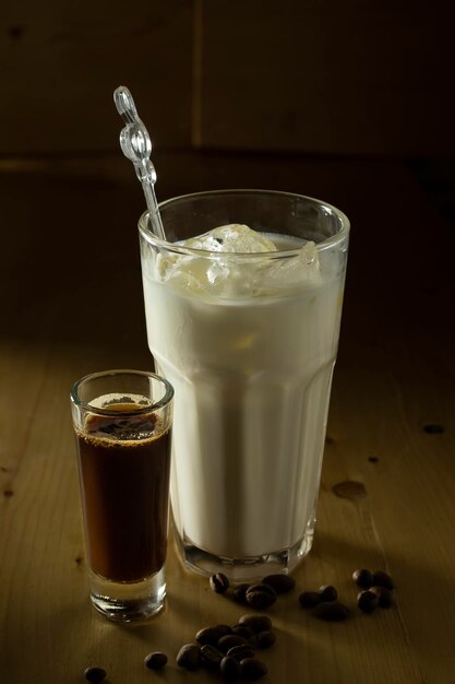 Coffee Cup and Beans on Wooden Table